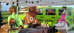 dog poop scooping booth at boise farmers market